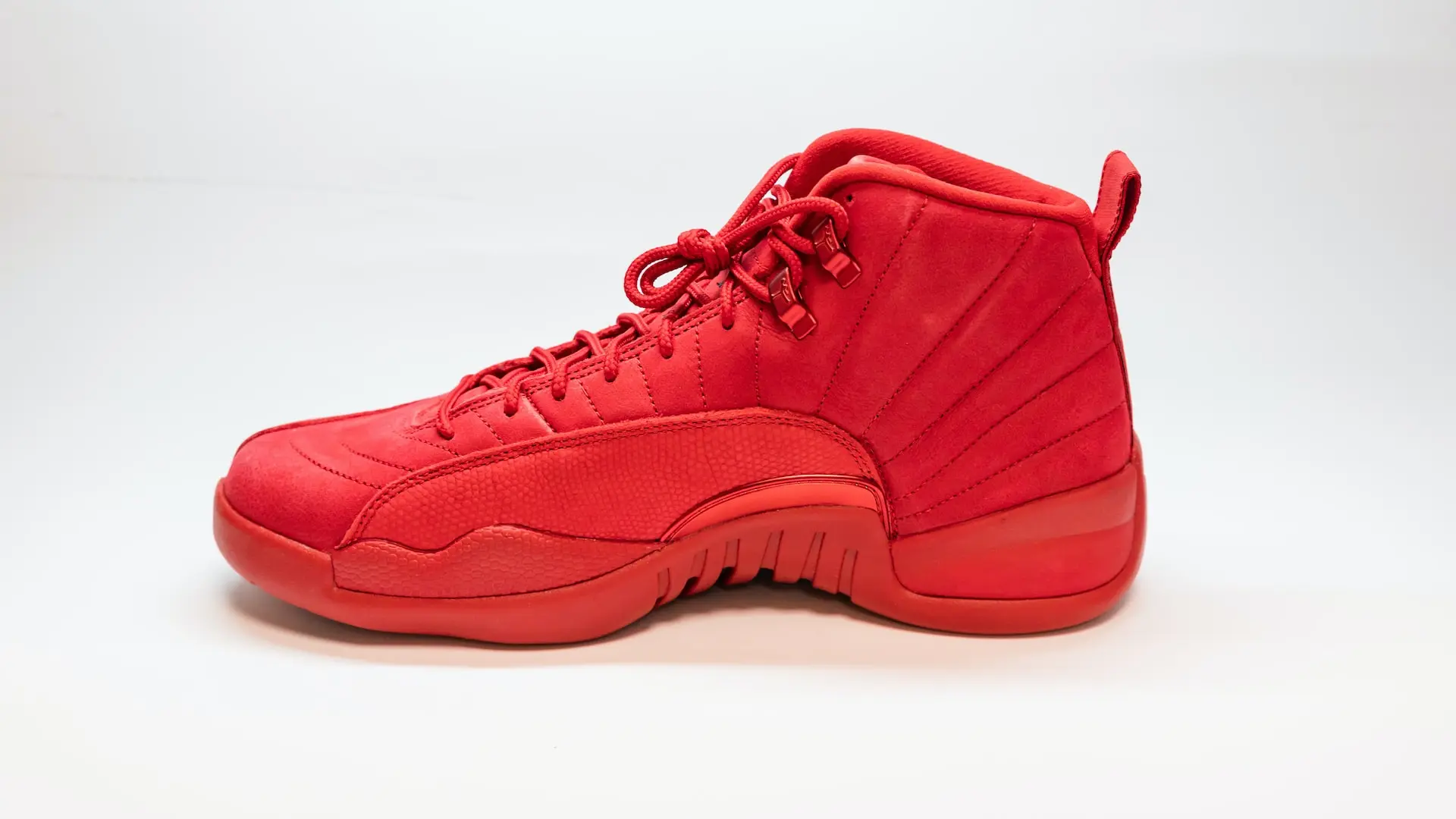 unpaired red Air Jordan 12