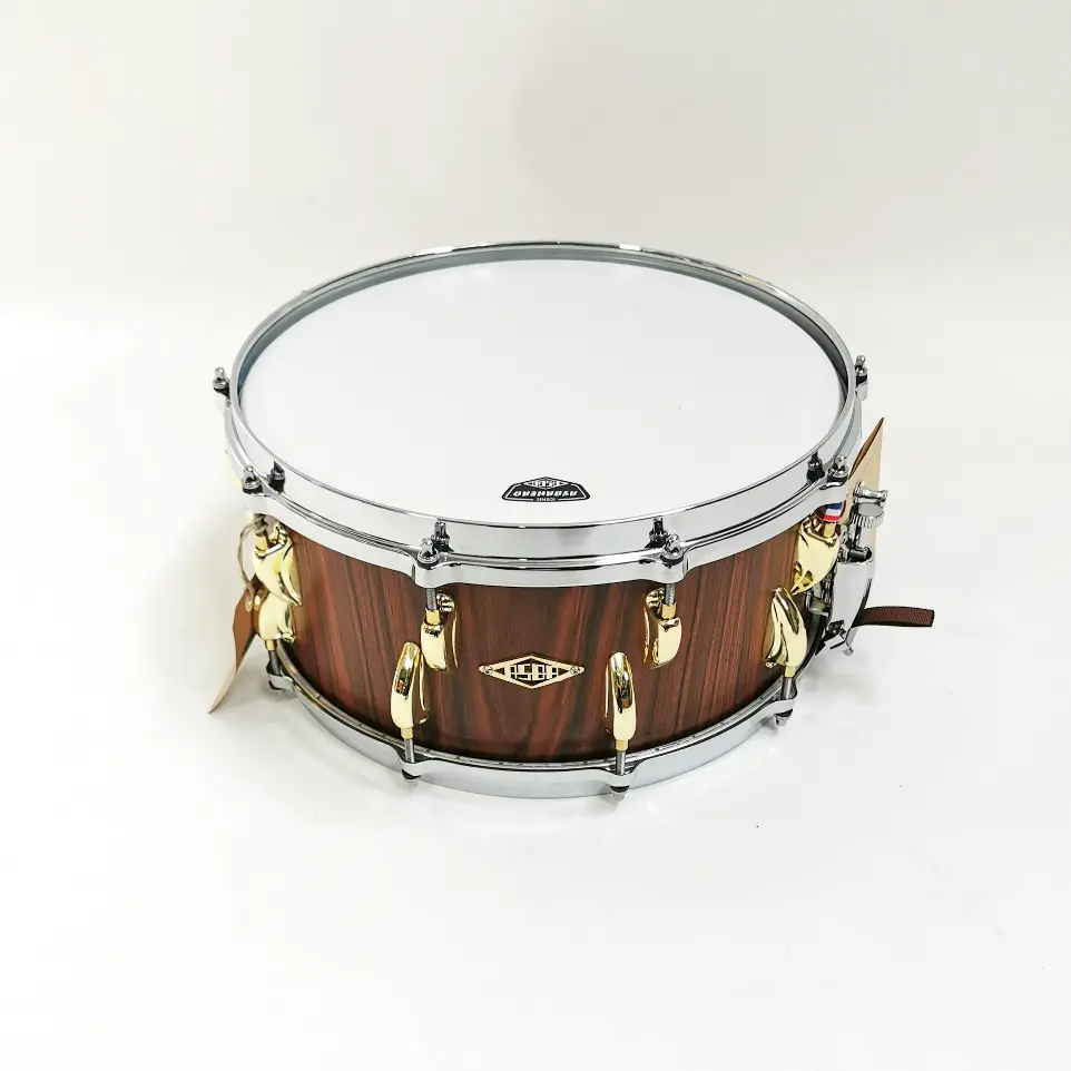 brown and white drum set